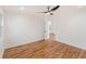 Empty bedroom shows hardwood flooring, white walls, and natural light from the window at 578 Center Hill Nw Ave, Atlanta, GA 30318