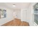 Bright bedroom with two windows, hardwood floors and a closet with paneled doors at 578 Center Hill Nw Ave, Atlanta, GA 30318