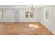 Inviting entryway featuring hardwood floors, white walls, and ample natural light at 578 Center Hill Nw Ave, Atlanta, GA 30318