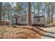 Angled view of charming home featuring updated siding, a welcoming front porch, and cozy curb appeal at 578 Center Hill Nw Ave, Atlanta, GA 30318