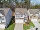 Charming two-story home with well-manicured lawn, an attached garage, and inviting curb appeal at 103 Bryon Ln, Acworth, GA 30102