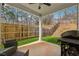 Covered back patio with ceiling fan, outdoor seating and a grill, perfect for entertaining at 103 Bryon Ln, Acworth, GA 30102