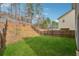 Expansive backyard with well-maintained lawn and a privacy fence, ideal for outdoor activities at 103 Bryon Ln, Acworth, GA 30102