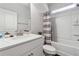 A clean bathroom with a modern sink, white cabinets and a tub with shower at 103 Bryon Ln, Acworth, GA 30102