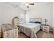 Cozy bedroom featuring matching furniture set, ceiling fan and comfortable bed at 103 Bryon Ln, Acworth, GA 30102