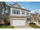 Charming two-story home with a brick and siding exterior and a two-car garage at 103 Bryon Ln, Acworth, GA 30102