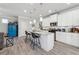 Bright kitchen features a large island with barstool seating, stainless appliances, and modern countertops at 103 Bryon Ln, Acworth, GA 30102