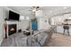 Open-concept living room and kitchen layout is ideal for entertaining with a cozy fireplace at 103 Bryon Ln, Acworth, GA 30102