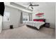 Spacious main bedroom with a ceiling fan, trey ceilings and large windows for ample natural light at 103 Bryon Ln, Acworth, GA 30102