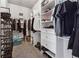 Walk-in closet featuring shelving, hanging rods, drawers, and storage space at 103 Bryon Ln, Acworth, GA 30102