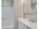 Clean and well-maintained bathroom with white fixtures, shower with curtain, and vanity sink at 2000 Variations Dr, Atlanta, GA 30329