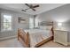 Charming bedroom featuring a bed with comfortable bedding, and two bright windows at 2000 Variations Dr, Atlanta, GA 30329