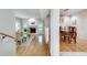 Open-concept living space with hardwood floors, fireplace, and seamless flow to the dining area at 2000 Variations Dr, Atlanta, GA 30329