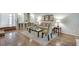 Bright living room with hardwood floors, fireplace, and built-in shelving, ideal for comfortable living at 2000 Variations Dr, Atlanta, GA 30329