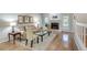 Inviting living room with hardwood floors, fireplace, and ample natural light, perfect for entertaining at 2000 Variations Dr, Atlanta, GA 30329