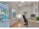 Bright office space with hardwood floors, built-in cabinets, and a modern desk setup at 2000 Variations Dr, Atlanta, GA 30329