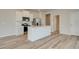 A kitchen with a center island featuring a modern stainless steel refrigerator at 224 Sanctuary Dr, Mcdonough, GA 30253