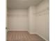 Walk-in closet with wire shelving and neutral carpet at 224 Sanctuary Dr, Mcdonough, GA 30253