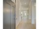Welcoming entryway boasts a light-filled foyer and sleek modern door at 117 Belvedere Rd, Mcdonough, GA 30253