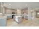 Modern kitchen with an island, stainless steel appliances and pendant lights at 117 Belvedere Rd, Mcdonough, GA 30253