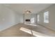 Bright living room featuring a fireplace and abundant natural light at 117 Belvedere Rd, Mcdonough, GA 30253