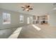 Spacious living area showcasing a view of the kitchen and natural light at 117 Belvedere Rd, Mcdonough, GA 30253