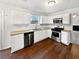 Well-equipped kitchen with modern appliances, granite countertops, and ample cabinet space at 4969 Portsmouth Ct, Lithonia, GA 30038