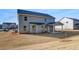 A spacious backyard and covered patio at 112 Felicity Pike, Locust Grove, GA 30248