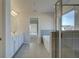 Bathroom featuring a tub, shower, and double sink vanity with white cabinets at 112 Felicity Pike, Locust Grove, GA 30248
