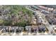 An aerial view of a well-planned suburban neighborhood with tree-lined streets at 620 Willow Haven Way, Suwanee, GA 30024
