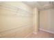 Walk-in closet with white wire shelving and carpet at 620 Willow Haven Way, Suwanee, GA 30024