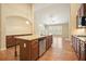 Spacious kitchen featuring an island, stainless steel appliances, and ample cabinet space at 620 Willow Haven Way, Suwanee, GA 30024