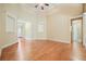 Spacious living area with hardwood floors, high ceilings, and access to other rooms at 620 Willow Haven Way, Suwanee, GA 30024