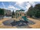 A playground sits adjacent to the pool at 620 Willow Haven Way, Suwanee, GA 30024