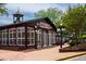 Roswell Mill building with elegant windows, lighting and updated facade at 1075 Lancaster Sq, Roswell, GA 30076