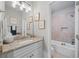 Bright bathroom featuring granite countertops, and tile flooring at 3111 Old Thompson Mill Rd, Buford, GA 30519
