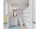 Cozy bathroom offers a vanity, a toilet and a shower with shower curtain at 3111 Old Thompson Mill Rd, Buford, GA 30519