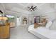 Spacious main bedroom boasts trey ceilings, ensuite bathroom access, and a barn door to the closet at 3111 Old Thompson Mill Rd, Buford, GA 30519