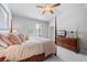 Relaxing bedroom boasts soft natural light and a tranquil ambiance at 3111 Old Thompson Mill Rd, Buford, GA 30519