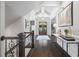 Open foyer showcasing hardwood floors, high ceilings, chandelier, and decor at 3111 Old Thompson Mill Rd, Buford, GA 30519