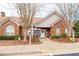 Charming clubhouse with brick facade, accessible entry, and well-maintained landscaping at 3716 Vineyards Lake Nw Cir # U-2, Kennesaw, GA 30144