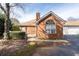Charming brick home with a manicured yard and attached garage, perfect for comfortable living at 3716 Vineyards Lake Nw Cir # U-2, Kennesaw, GA 30144