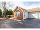 Lovely home featuring a brick facade, attached garage, and well-maintained landscaping at 3716 Vineyards Lake Nw Cir # U-2, Kennesaw, GA 30144