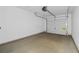 Spacious garage with a large, functional door, ample space for parking and storage at 3716 Vineyards Lake Nw Cir # U-2, Kennesaw, GA 30144