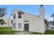Spacious backyard with sliding glass doors, a patio and green grass at 6595 Browns Mill Ferry Dr, Lithonia, GA 30038