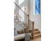Bright entryway featuring a staircase with black iron railings and a cozy bench at 1273 Danner Se St, Atlanta, GA 30316