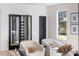 Comfortable living room with a wine rack feature, modern furniture, and natural light at 1273 Danner Se St, Atlanta, GA 30316