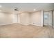 Finished basement with plush carpeting, recessed lighting, and a projector at 1474 Benjamin Sw Ct, Marietta, GA 30064