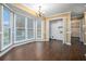 Sunlit dining area featuring hardwood floors and views of the backyard deck at 1474 Benjamin Sw Ct, Marietta, GA 30064