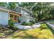 Charming home entrance with a walkway, landscape plants, and a well-manicured lawn at 3339 Somerset Se Trce, Marietta, GA 30067